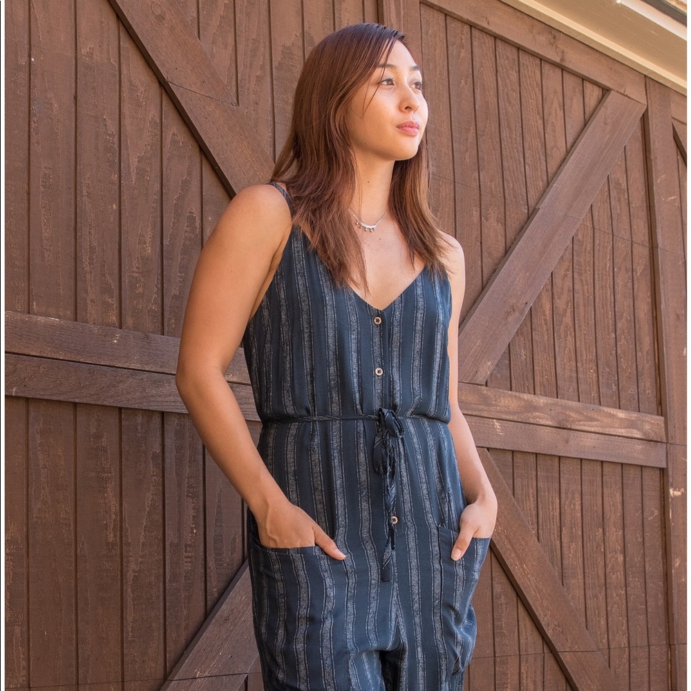 Blue pinstripe jumper.